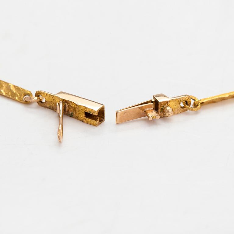 Björn Weckström, Halsband "Janus", 14K guld, rökkvarts och bergskristall. Lapponia 1969.