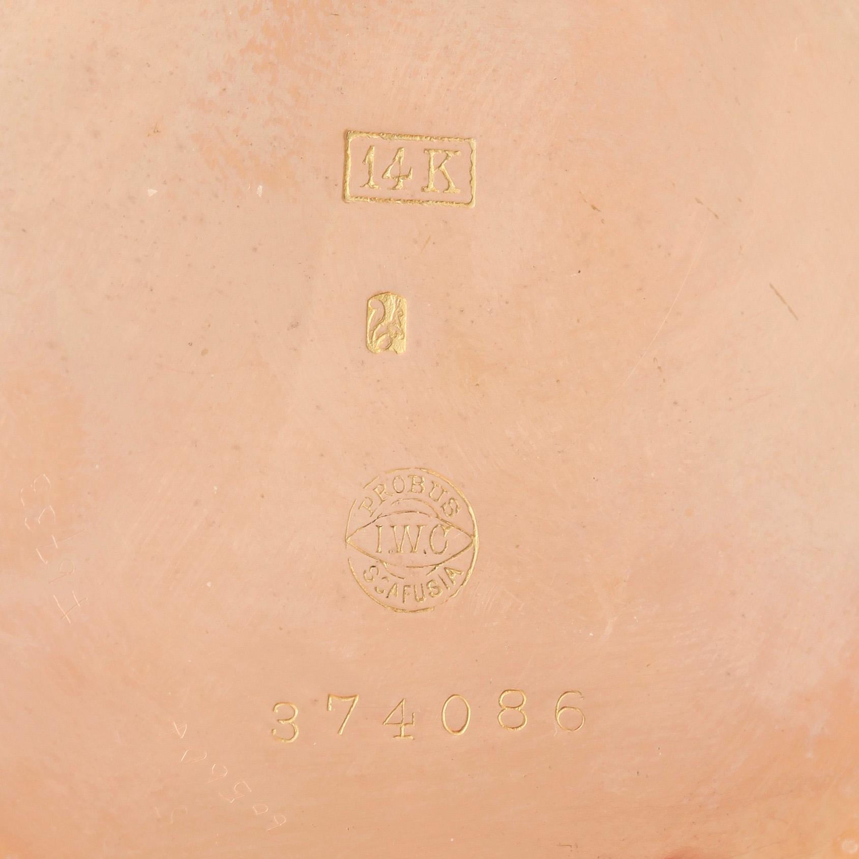 HERRFICKUR OCH KLOCKSTÄLL, 14k guld, boett märkt IWC, International Watch Company, Schaffhausen, 1900-talets första hälf.