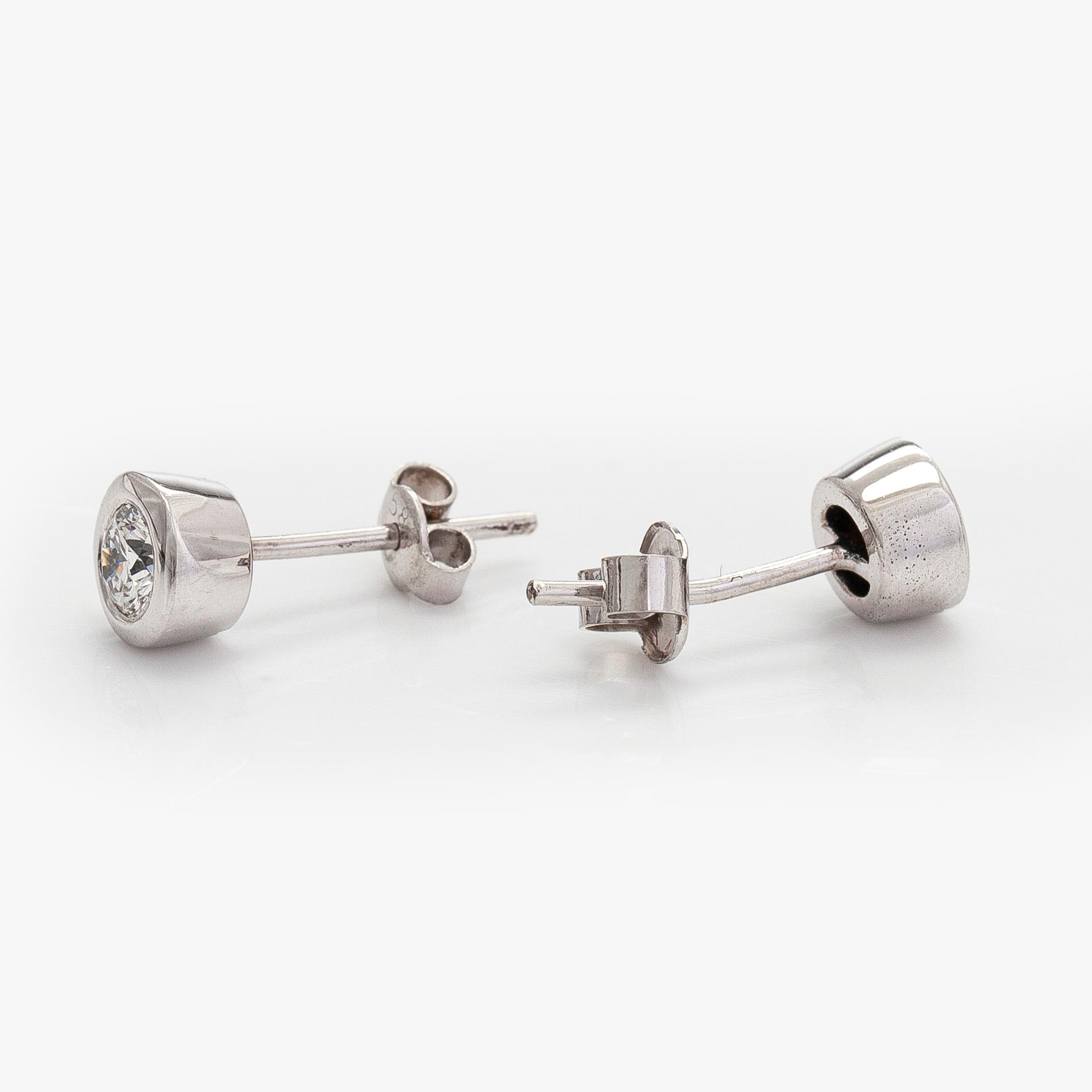 Earrings, brilliant-cut diamonds totalling circa 0.60 ct, 14K white gold.