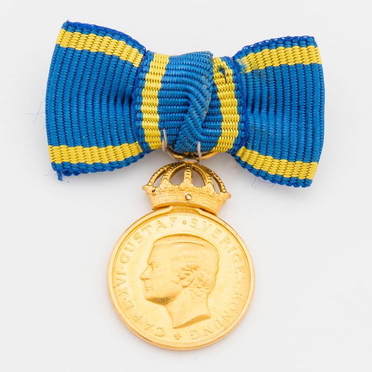 A Swedish Royal 23K gold medal.