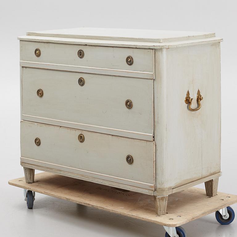 A chest of drawers, circa 1900.