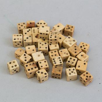 A OCLLECTION OF 36 BONE MINIATURE DICE, 19th century.