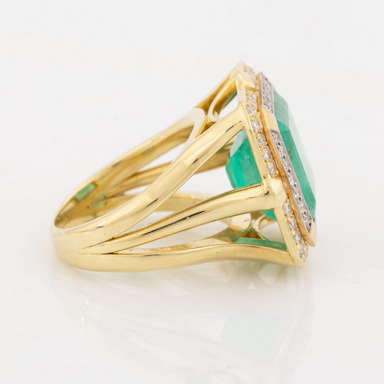 Emerald and brilliant-cut diamond ring.