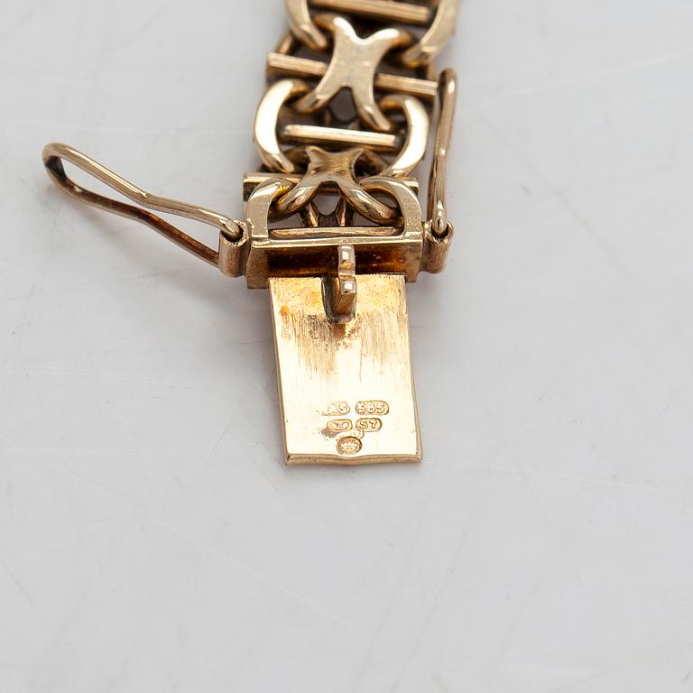 A 14k gold bracelet, x-link. Finnish import marks 1971.