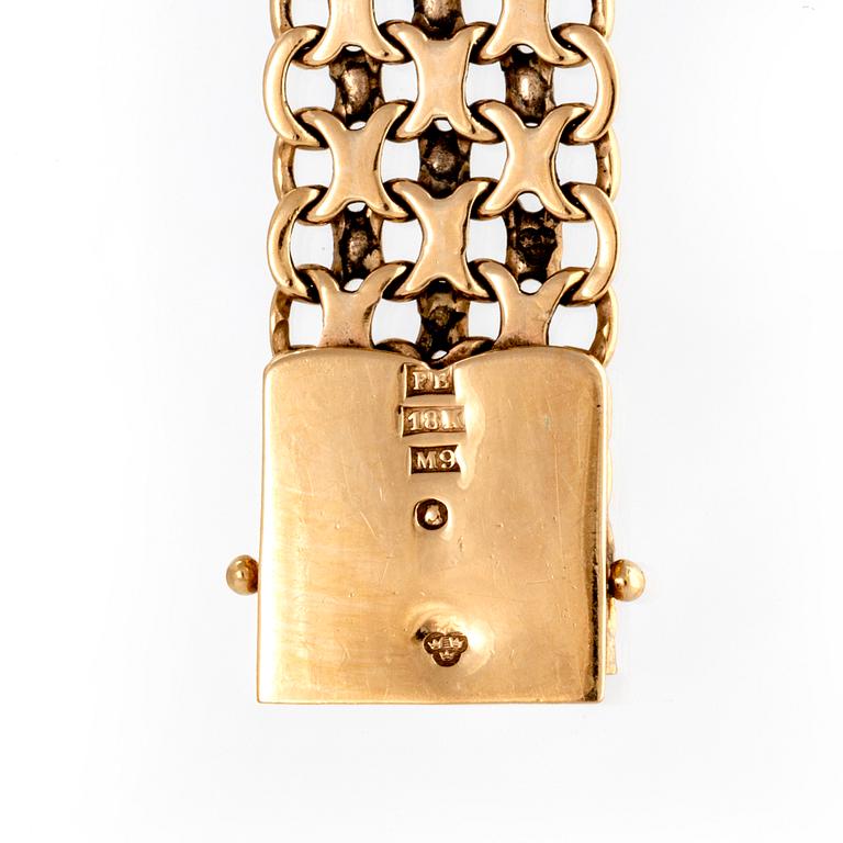 Armband 18K guld X-länk Stockholm 1962.