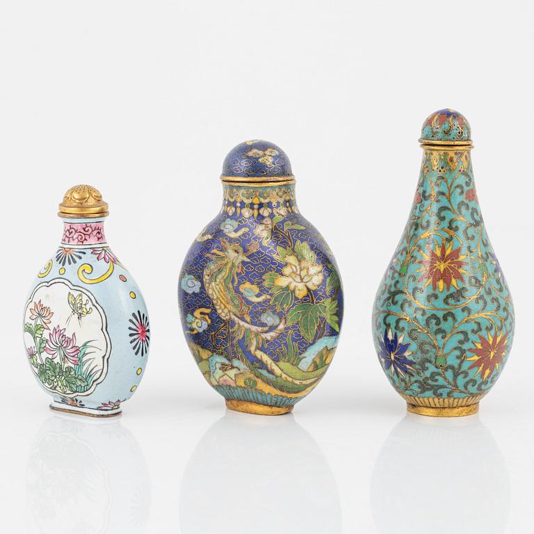 Ten snuff bottles, stone, glass and cloisonné, China, 20th century.