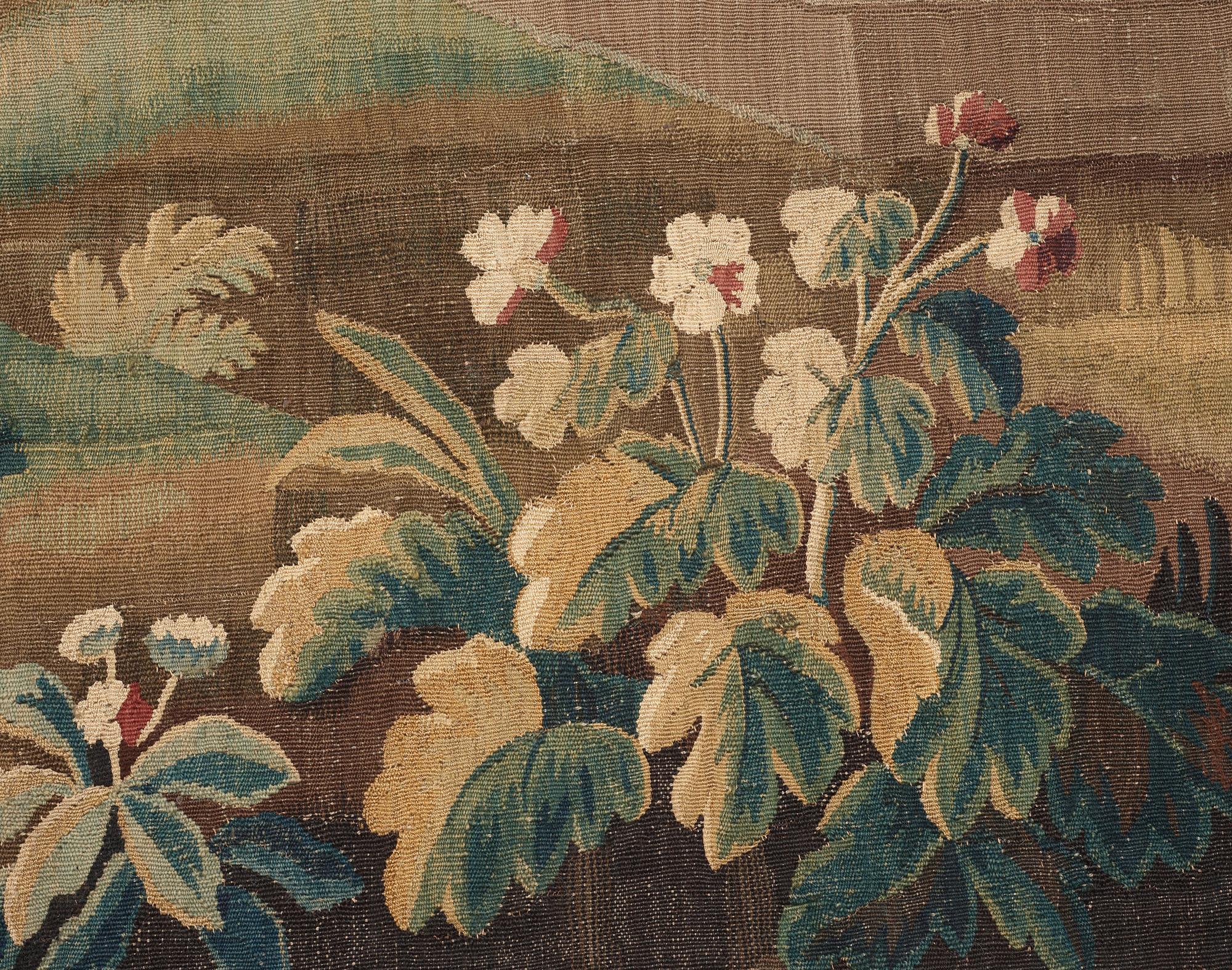 VÄVD TAPET, gobelängteknik. Landskap med nunna. 244,5 x 232,5 cm. Flandern omkring 1700.