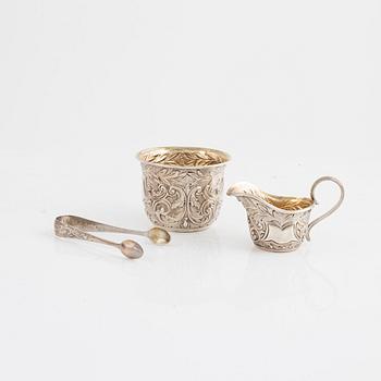 A silver sugar bowl with thongs and a creamer, in original box, Mappin & Webb, London, England, 1900-1901.