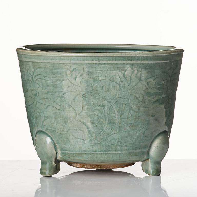 A large celadon tripod censer, Ming dynasty (1368-1644).