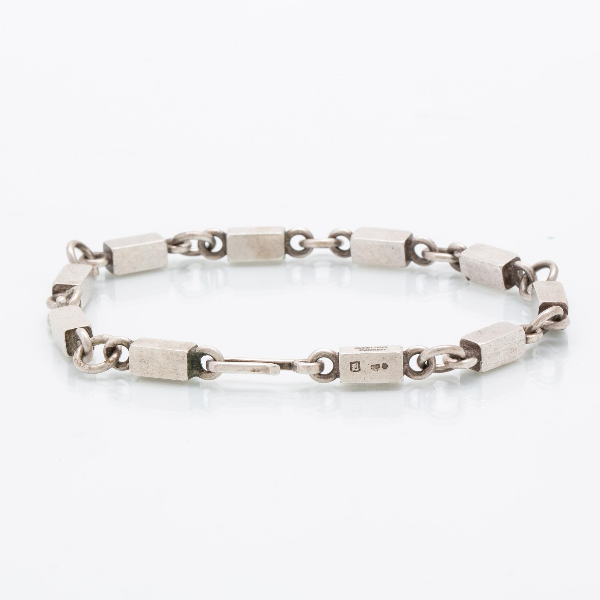 A Swedish sterling sivler bracelet mark of Wiwen Nilsson Lund 1962 length 24 cm, weight 347 grams,