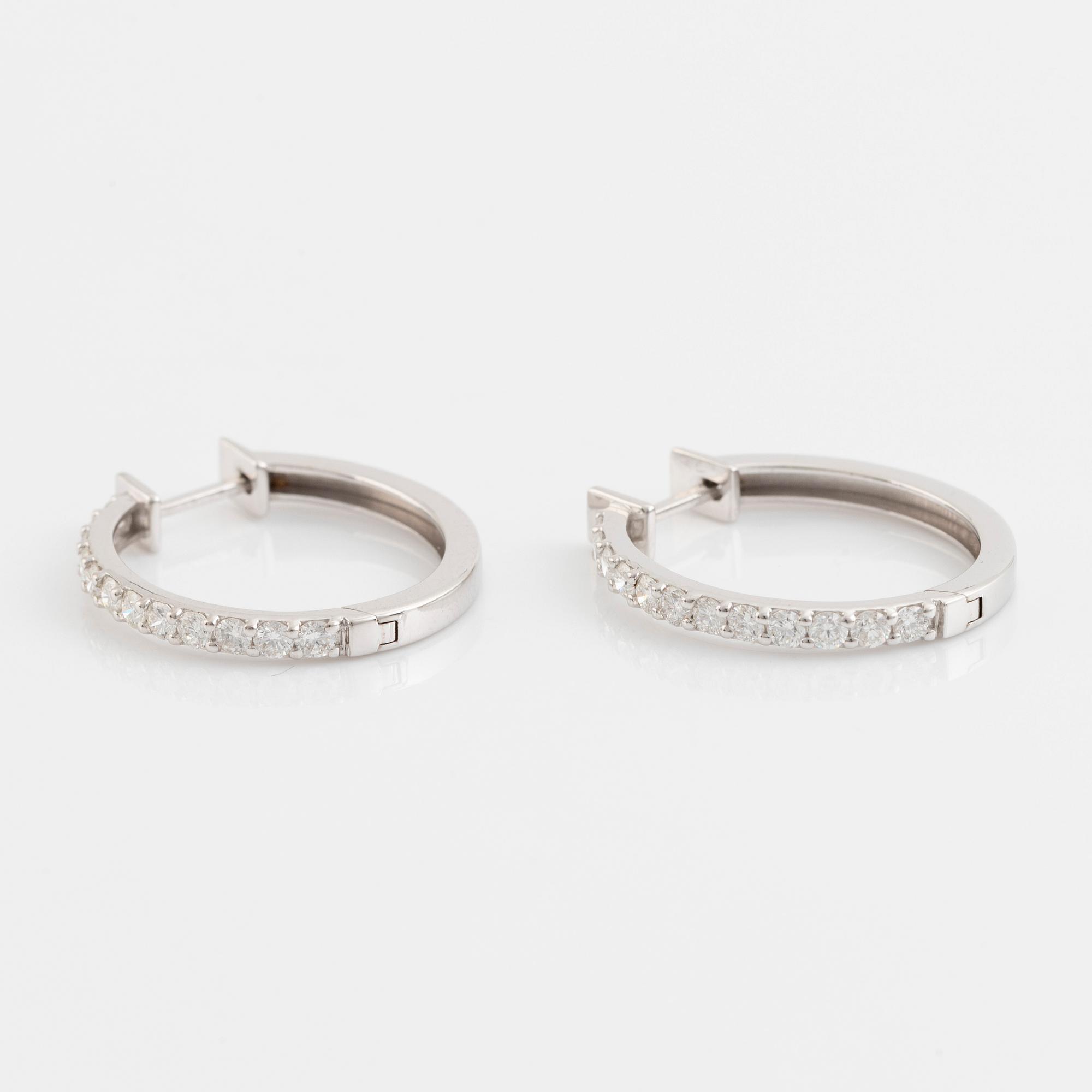 Brilliant cut diamond hopp earrings.