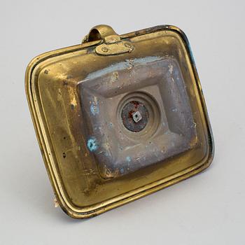 A 19th century brass candlestick.