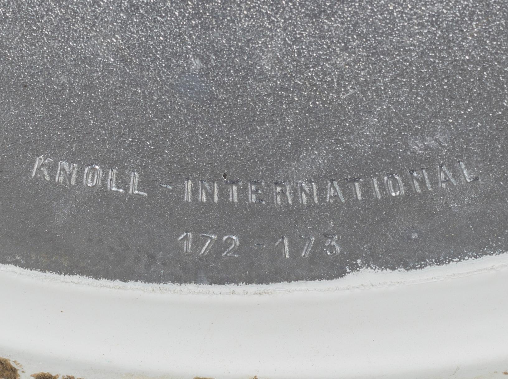 AN EERO SAARINEN "TULIP" TABLE BY KNOLL INTERNATIONAL.