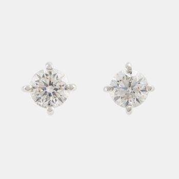 Brilliant cut diamond stud earrings.
