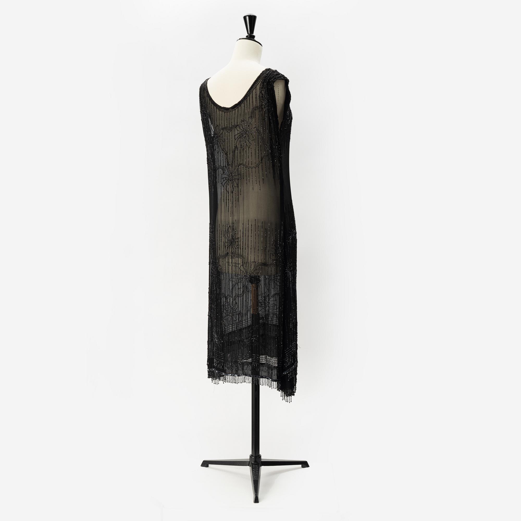 A 1920's pearl embroidered dress.