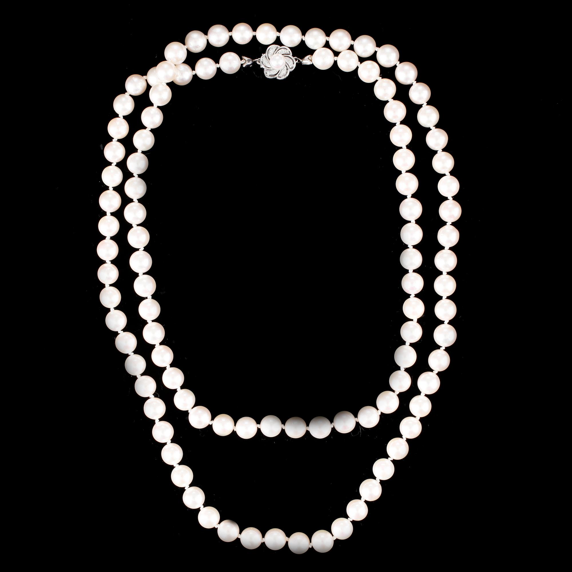 COLLIER, odlade rosa tonade saltvattenspärlor, lås 18k vitguld med små diamanter och pärla. Ca1980/90-tal.