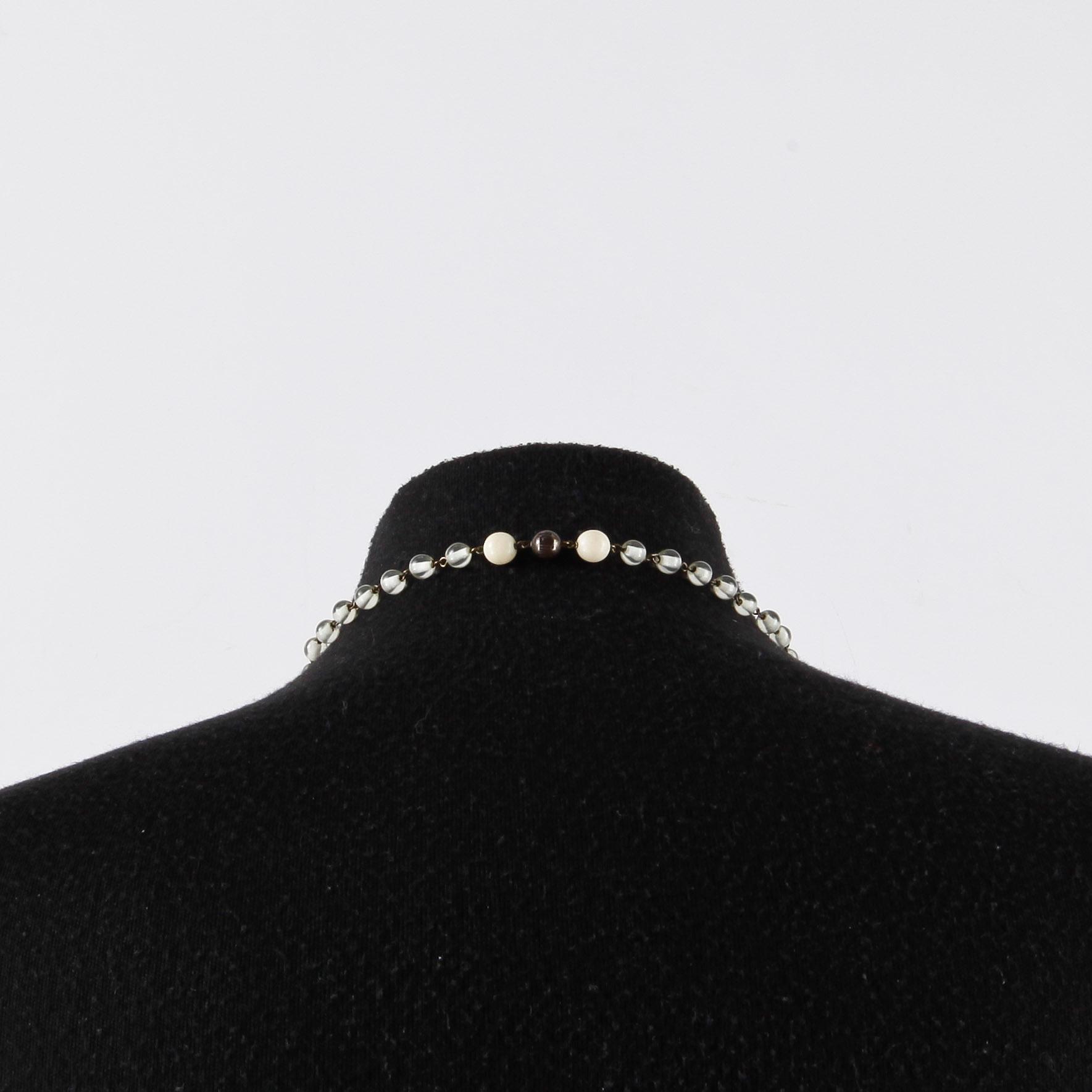 DONATELLA PELLINI, a necklace.