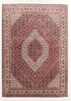An old Bidjar carpet approx 240x174 cm.