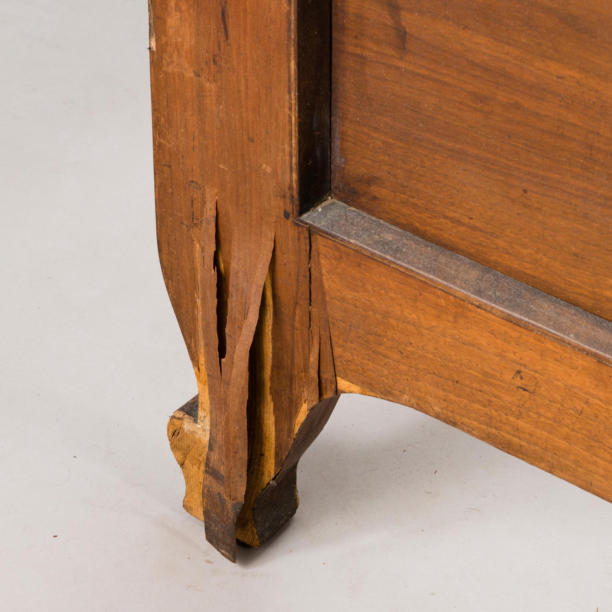 A pair of early 20th Century art nouveau style beds.