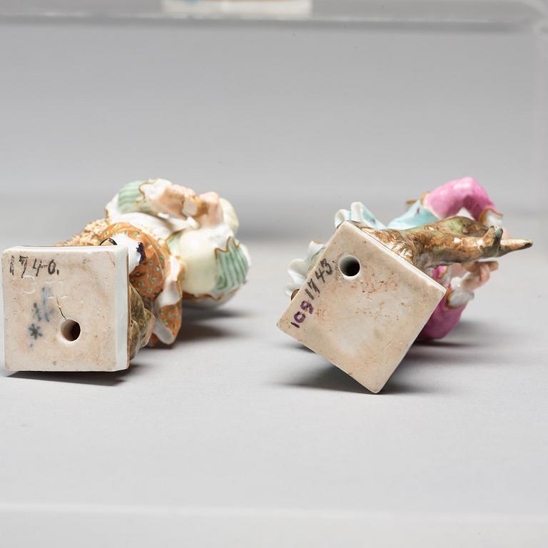 A group of five porcelain figurines of children, Meissen and Vienna.