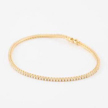 Tennis bracelet, 18K gold with brilliant-cut diamonds.