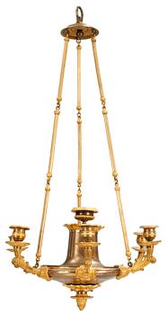 594. A French Empire early 19th century gilt bronze six-light hanging-lamp.