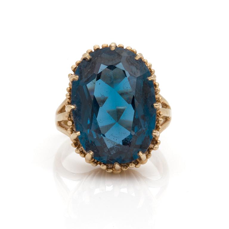 A synthetic blue spinel ring.