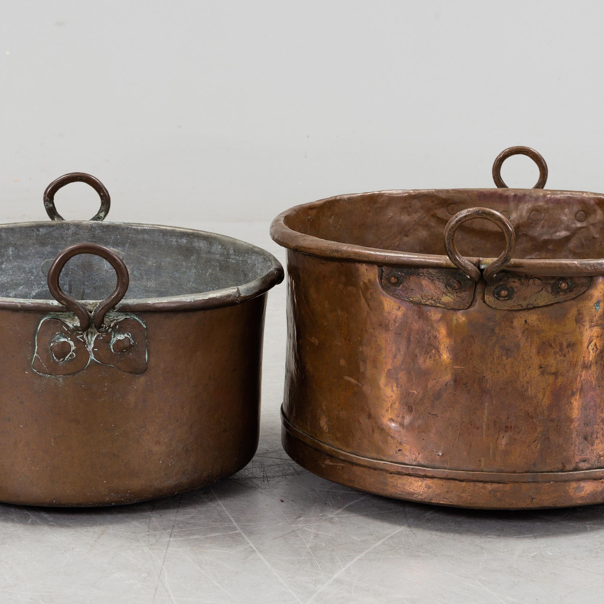 two copper pots from the 19th century.