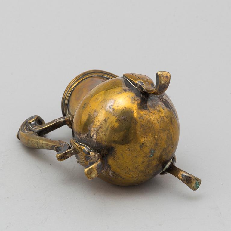 An 18th century bronze jug.