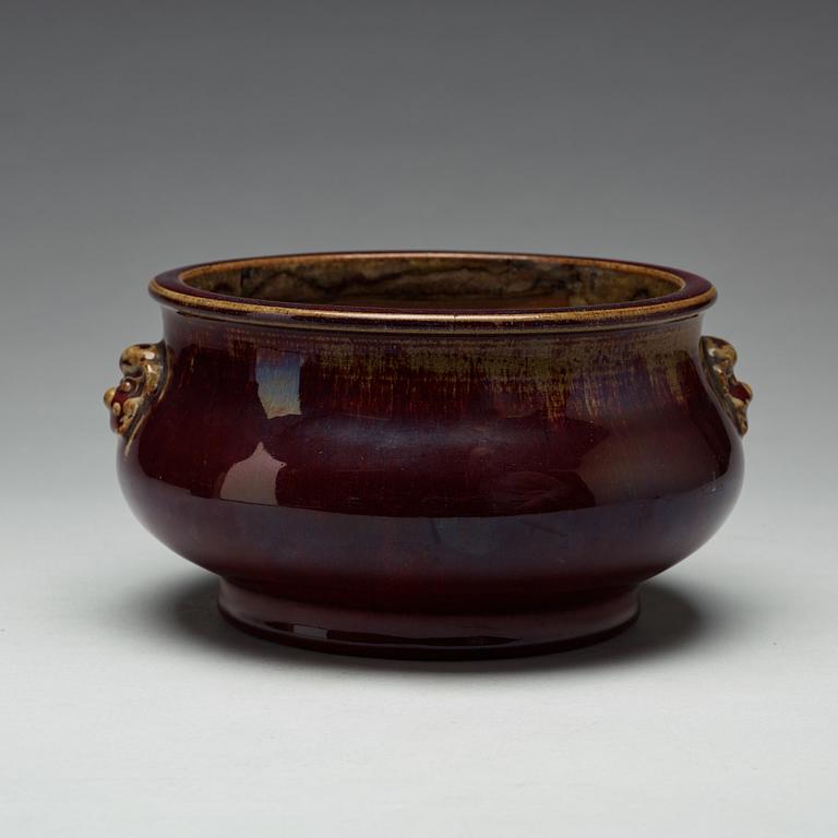 A 'sang de boef' glazed censer, Qing dynasty, 19th century.