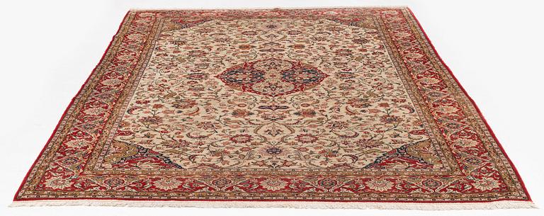 A mid 20th century central persian silk Qum carpet, c. 320 x 212 cm.