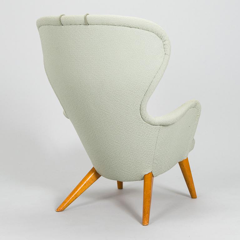 Carl Gustaf Hiort af Ornäs, A mid-20th-century armchair 'Siesta' manufacturer Puunveisto Oy - Träsnideri Ab, Finland.