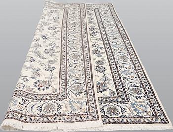 A part silk Nain carpet, ca 305 x 198 cm.