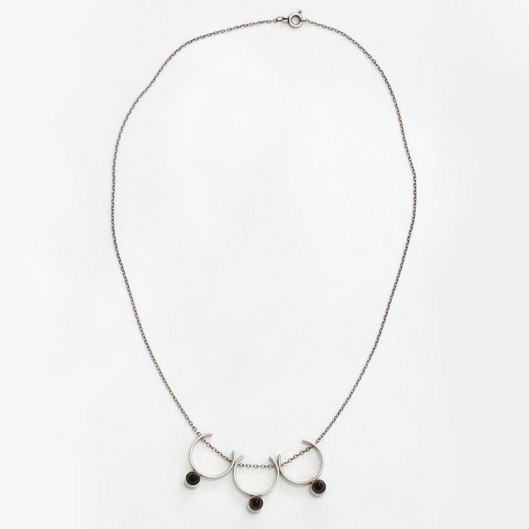 Elis Kauppi, A silver and smoky quartz necklace. Kupittaan kulta, Turku 1961.