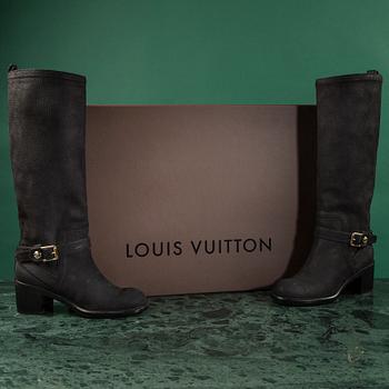 Boots, by Louis Vuitton.