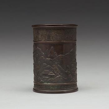 A bronze brush pot, Qing dynasty, circa 1900.