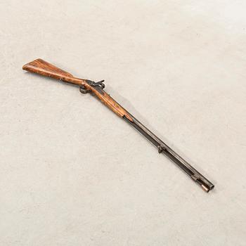 A percussion gun., Swedish,.