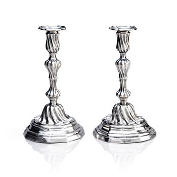 A pair of Italian 18th century rococo silver candlesticks, mark of Giovanni Battista Carron (active 1753-1778), Turin.