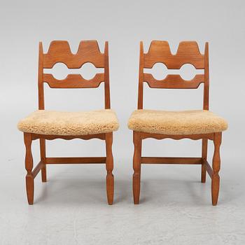 Henning Kjærnulf, a set of six oak 'Razorblade' chairs with new sheepskin upholstery, Nyrups, Denmark, 1960s.