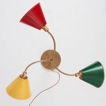 Josef Frank, a brass and black lacquered floor lamp model "2431", Firma Svenskt Tenn, Sweden.