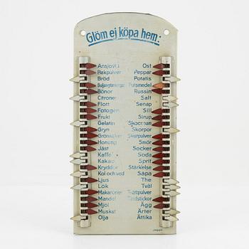 A metal shopping list, 1930's/40's.