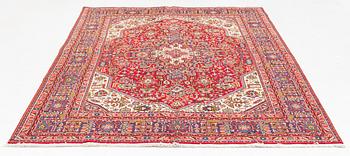 A Tabriz carpet, c. 300 x 200 cm.