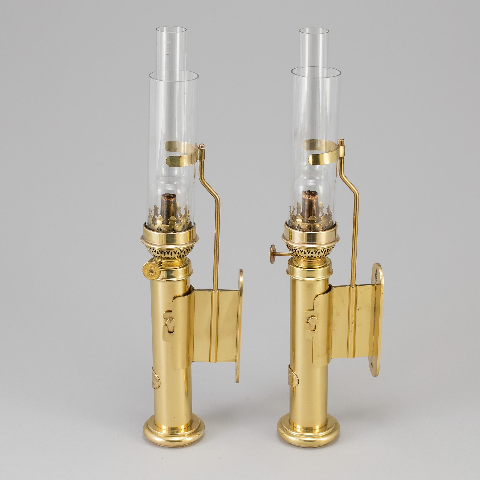 A pair of brass kerosene lamps, GV Harnisch Eftr, Copenhagen, 20th century.