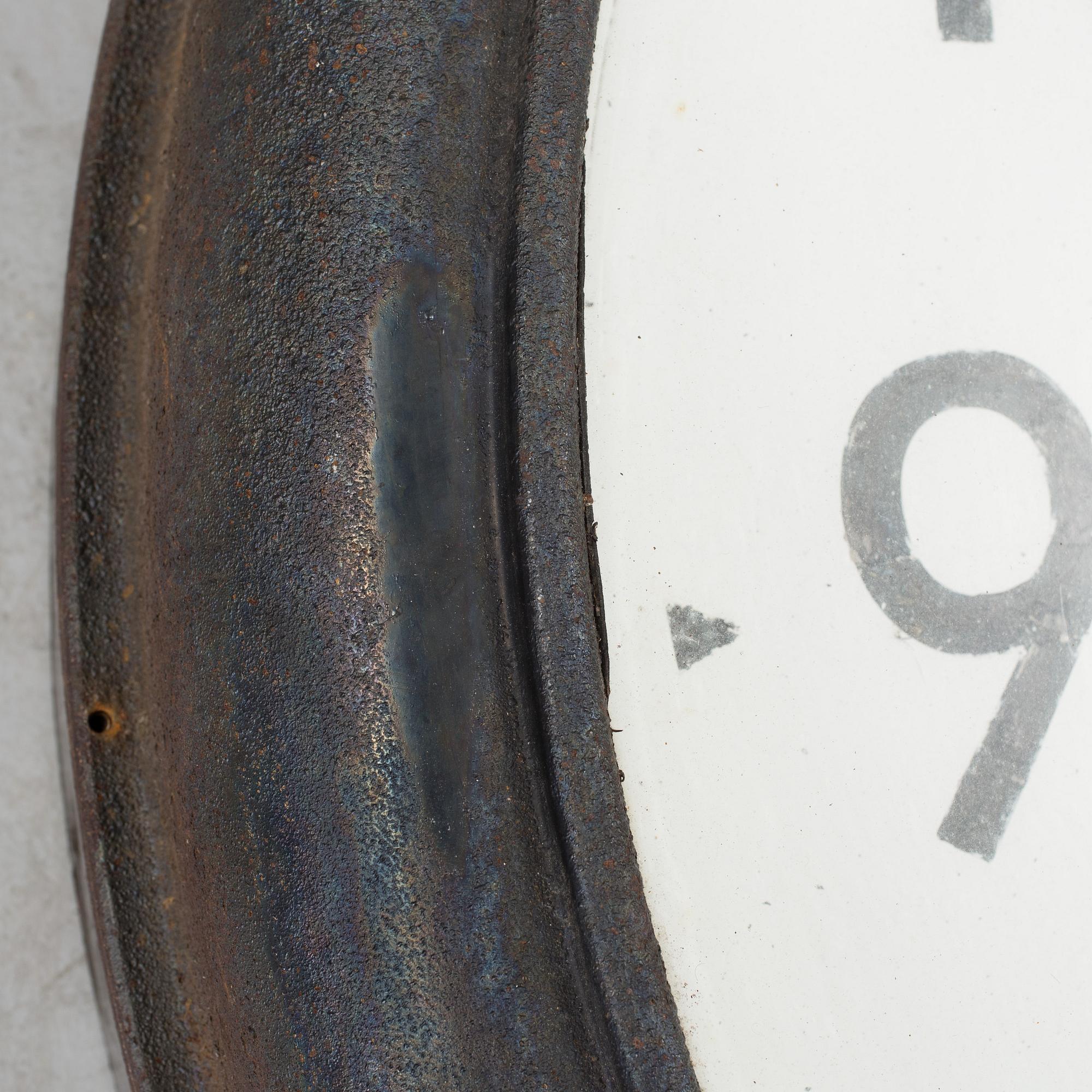 A 1930s wall clock.