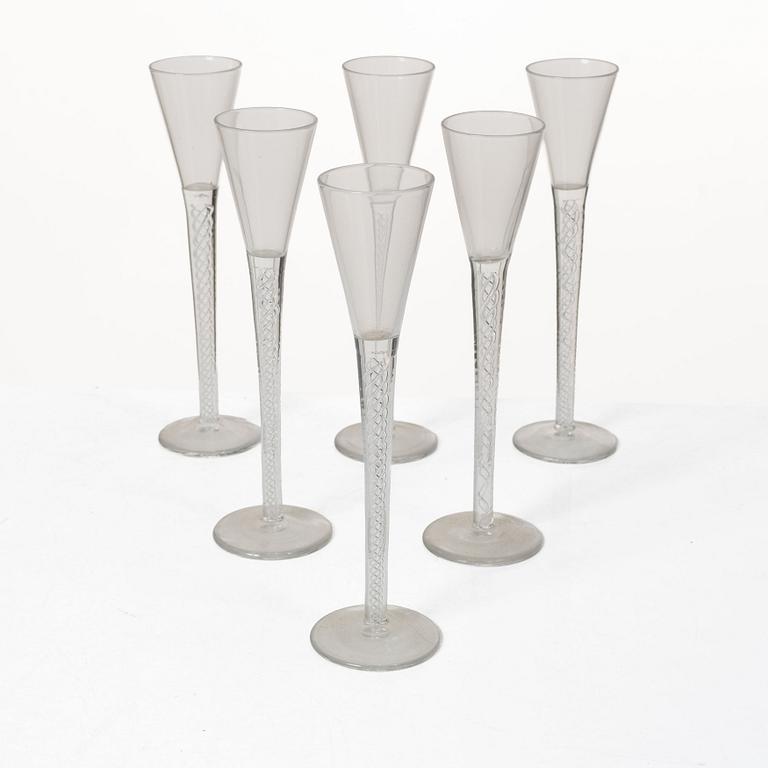 A set of six glasses with spiral stems, around 1900.