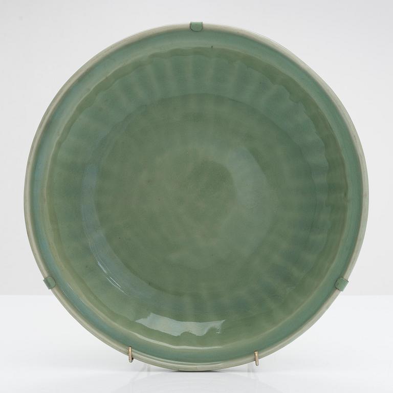 A celadon glazed dish, Ming dynasty (1368-1644).