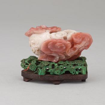 A possible agathe brush washer, with a stained green stand, Qing dynasty, presumably Qianlong (1736-95).