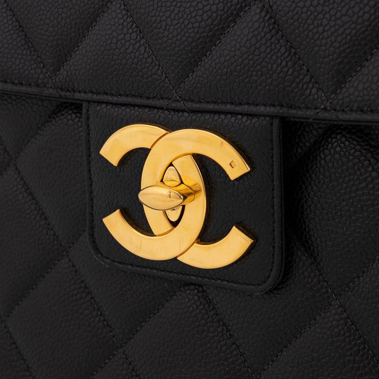 Chanel, a black caviar leather briefcase.