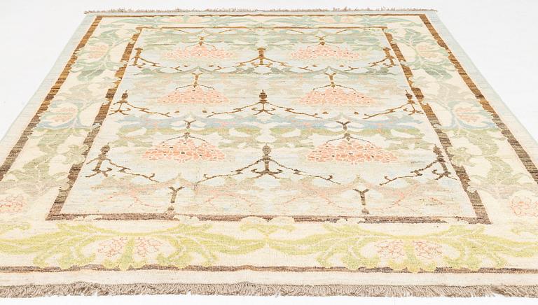 A west persian carpet of C.F.A. Voysey Design, c. 351 x 249 cm.