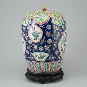 A 20th century famille rose pot with cover.